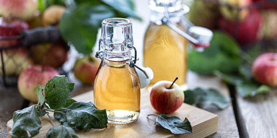 Vinegar Bottles with apples