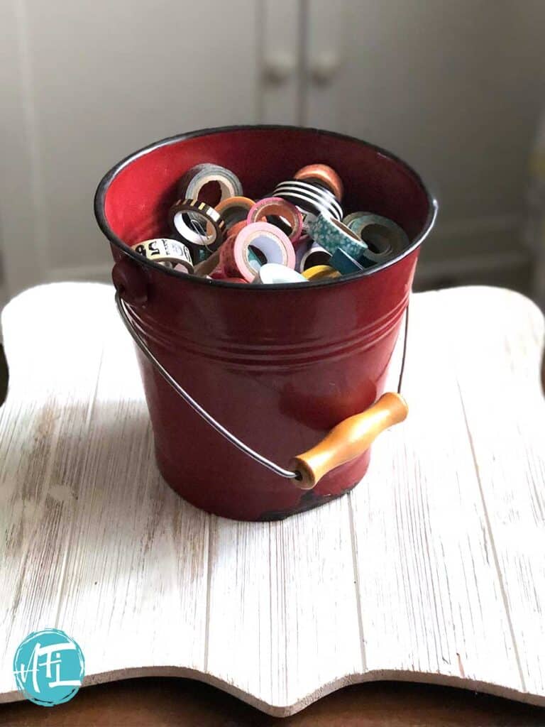 Cool old red vintage bucket full of washi tape