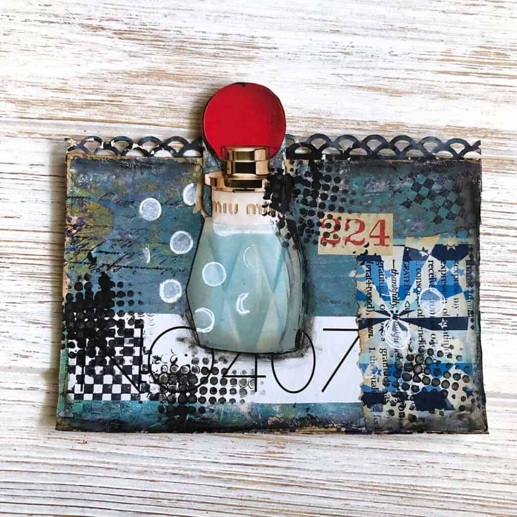 Perfume Bottle - Feminine Altered Rolodex - Blue and black and white. 