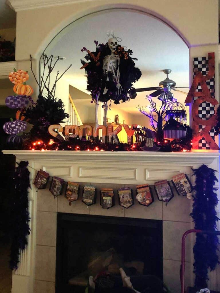 Night view of my halloween mantle with the lights on!