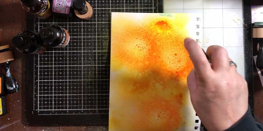 Spray with water to blend ink or add more spray inks in complimentary colors