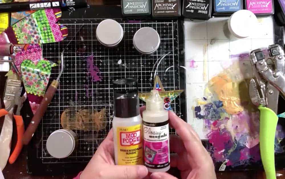 Use Dimensional Mod Podge or Glossy Accents to make your shapes "hard"