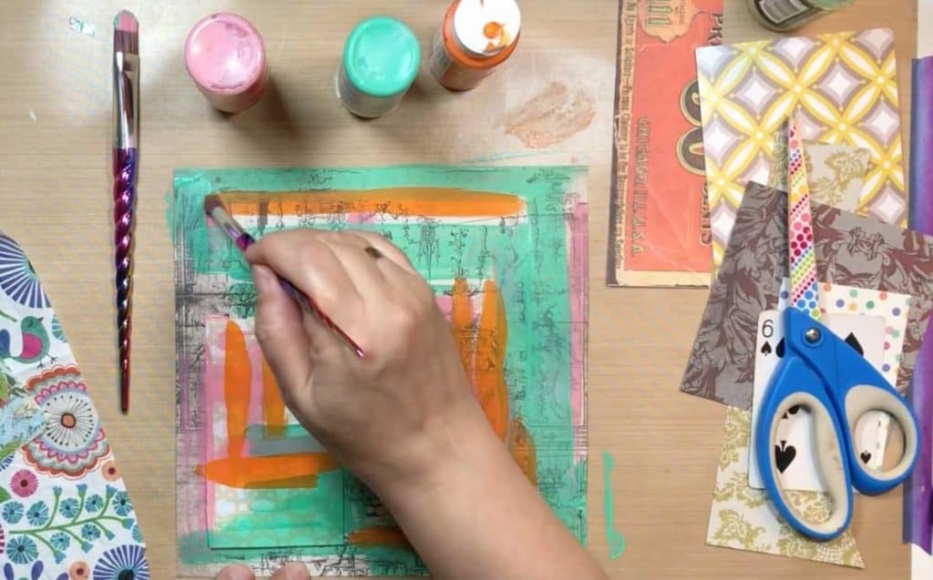 Paint some color marks on your scrapbook paper