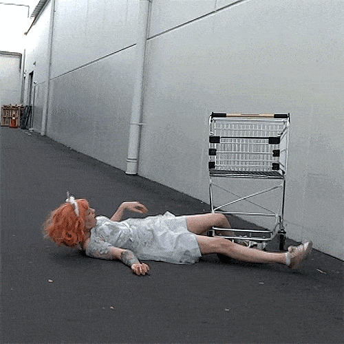Woman falling down with shopping cart from giphy.com