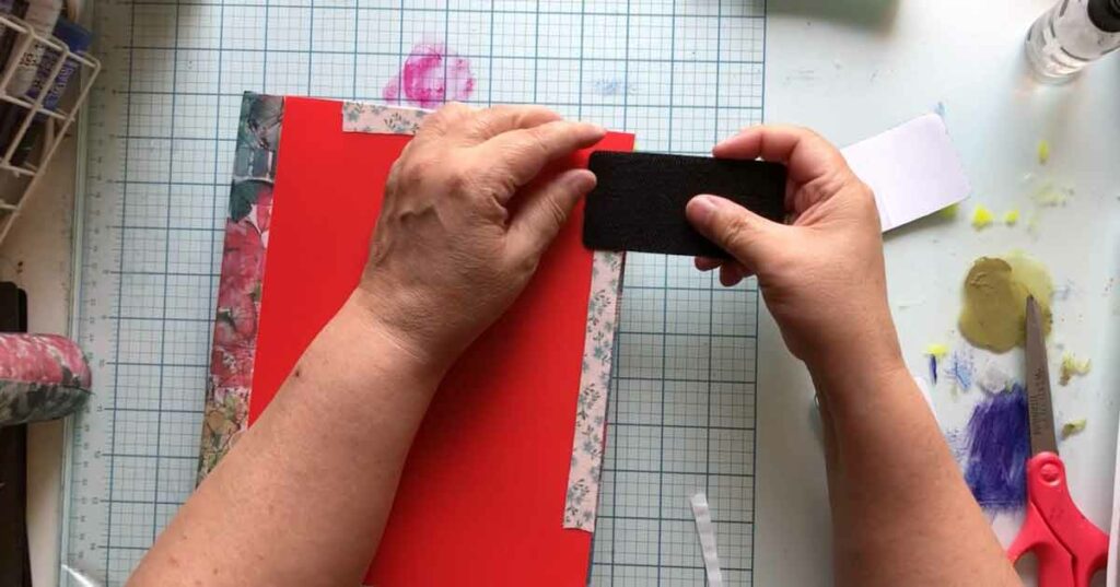 Use The Hook and Loop (Velcro) To Keep The Book Closed
