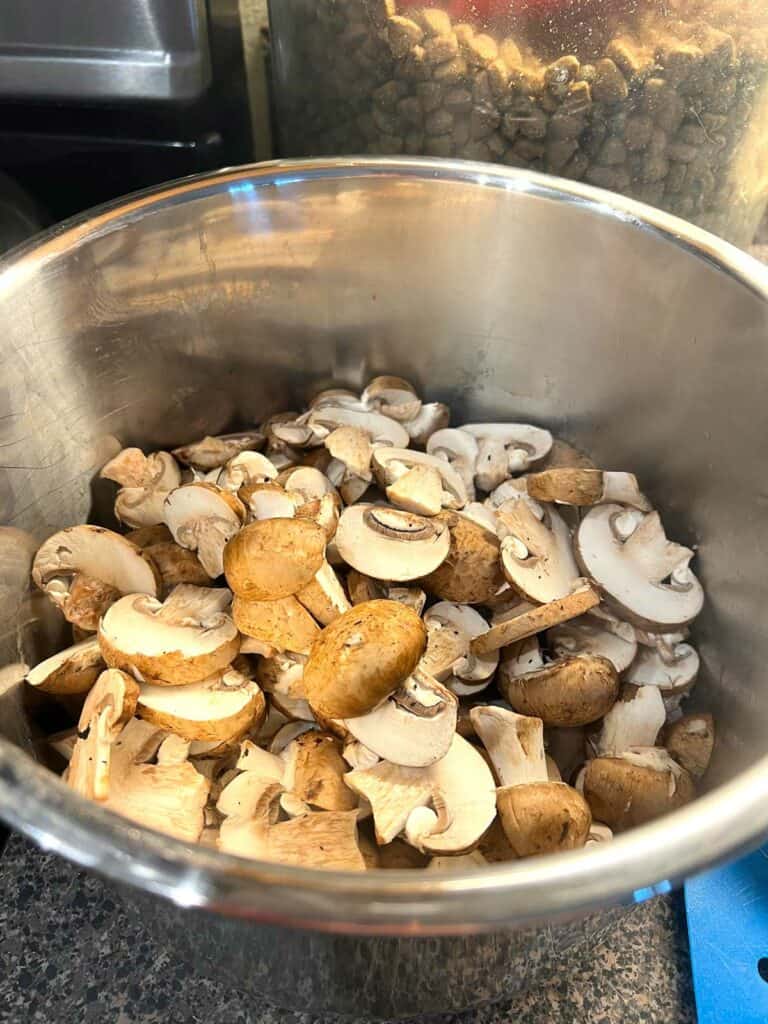 5. Throw your sliced mushrooms on top