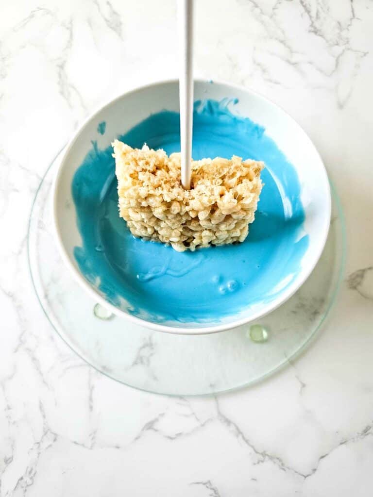 Blue Candy Covered Rice Krispie Pops - A Sweet Treat
