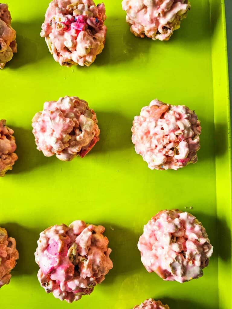 Pink Animal Cracker Popcorn Balls With Marshmallows
