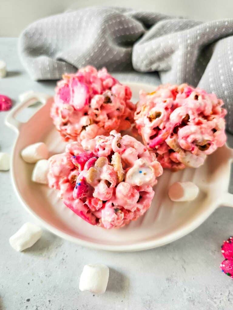 Pink Animal Cracker Popcorn Balls With Marshmallows
