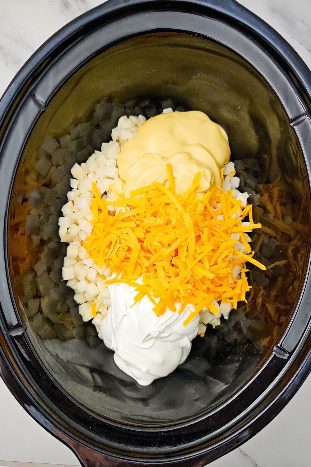Cheesy Crockpot Potatoes - The Easiest Side Dish Ever