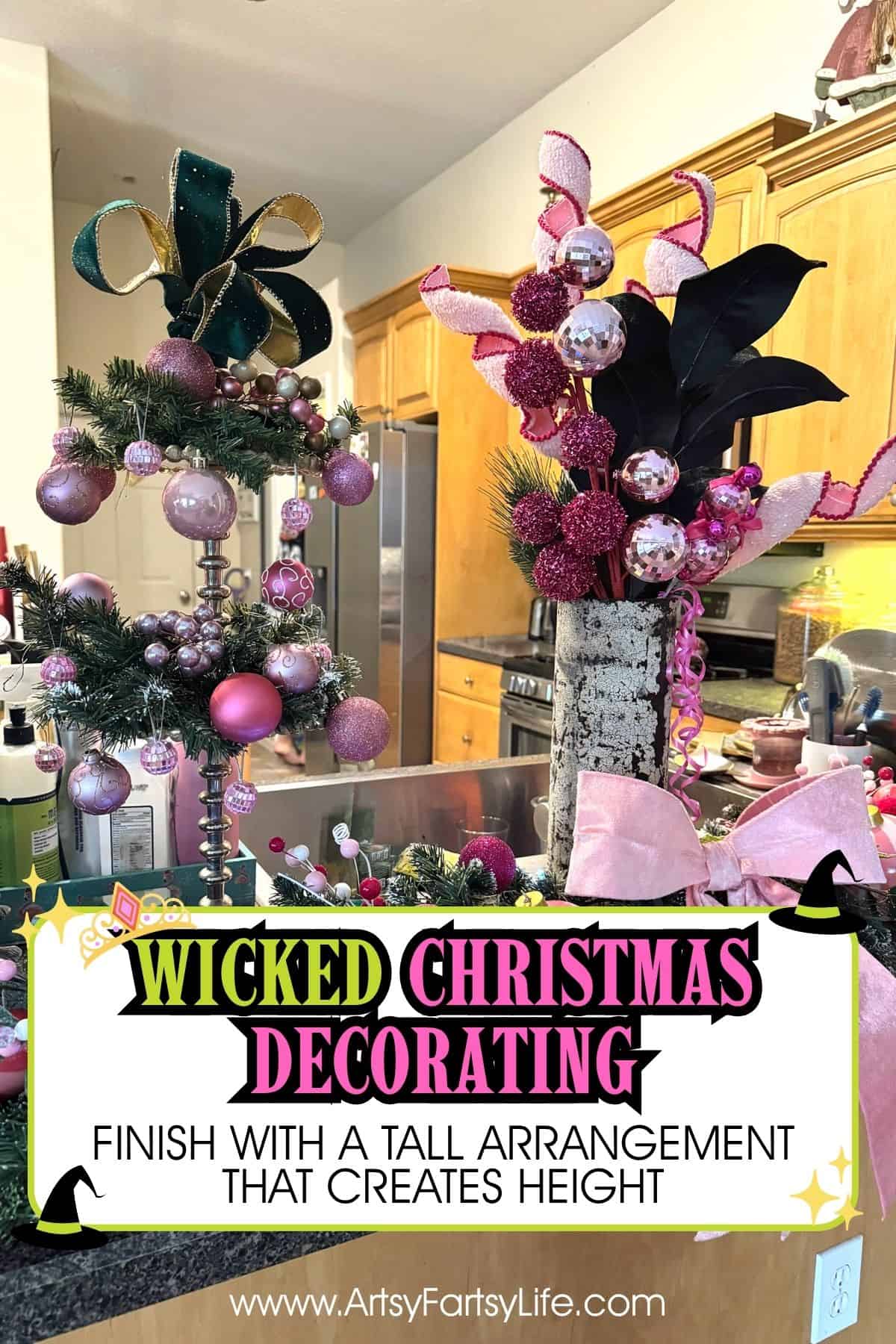 Looking for Wicked Christmas decorations but coming up empty? Same here! When I couldn’t find a single Wicked-themed piece in the stores, I created my own Wicked Christmas decor display using what I already had plus a few smart finds. With a palette of dark green and black for Elphaba and pink and gold for Galinda, I turned my kitchen counter into a pink and green Christmas showstopper for my Wicked-loving granddaughter.